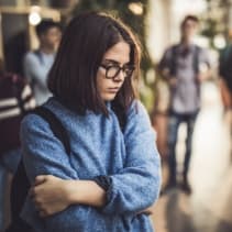 woman looking sad