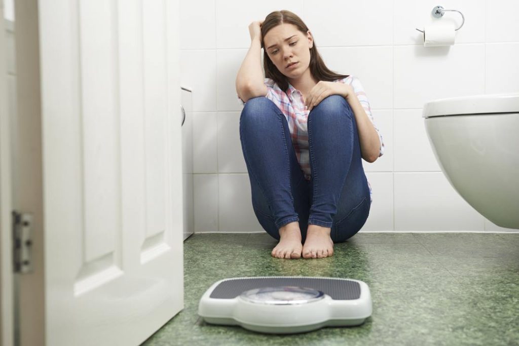 young woman with eating disorder