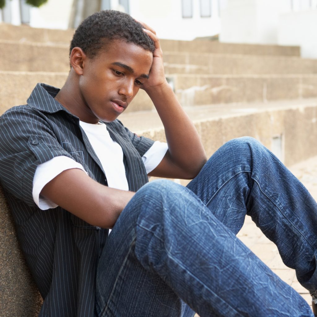Young man looking depressed